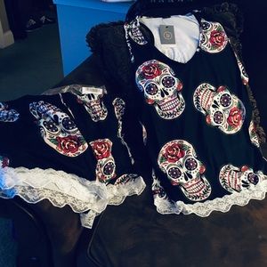 Skull pajamas. Sleeveless top and short bottoms.